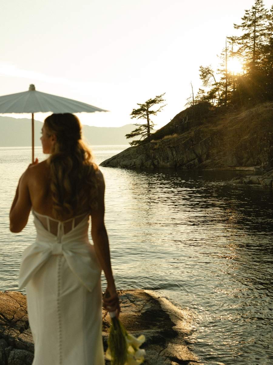 A cinematic wedding portrait in warm evening light
